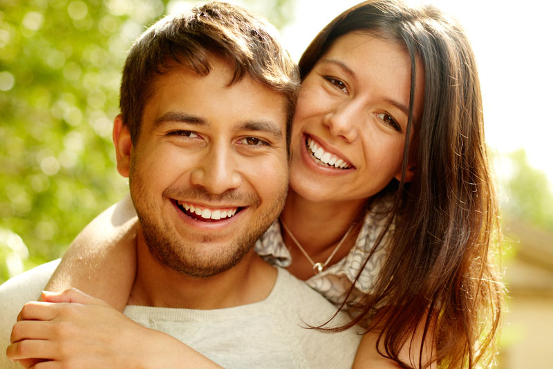 Dental Patients Smiling With Well Cared For Dental Implants In San Francisco, CA