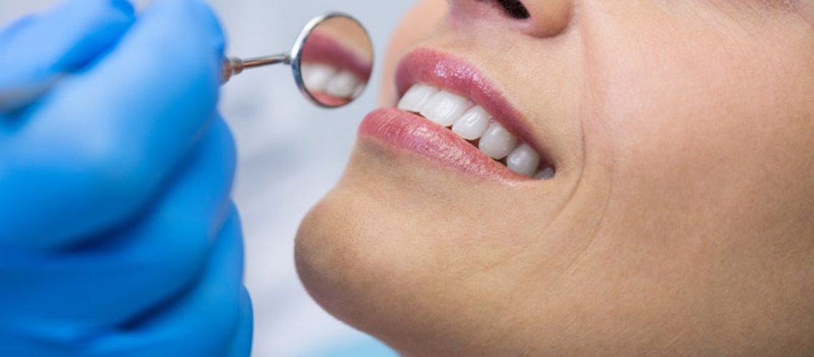 Dental Patient Smiling During A Procedure